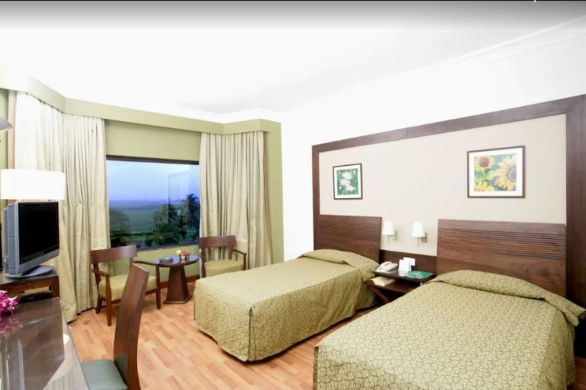 The Retreat - Hotel&centro de convenciones Bombay Habitación foto